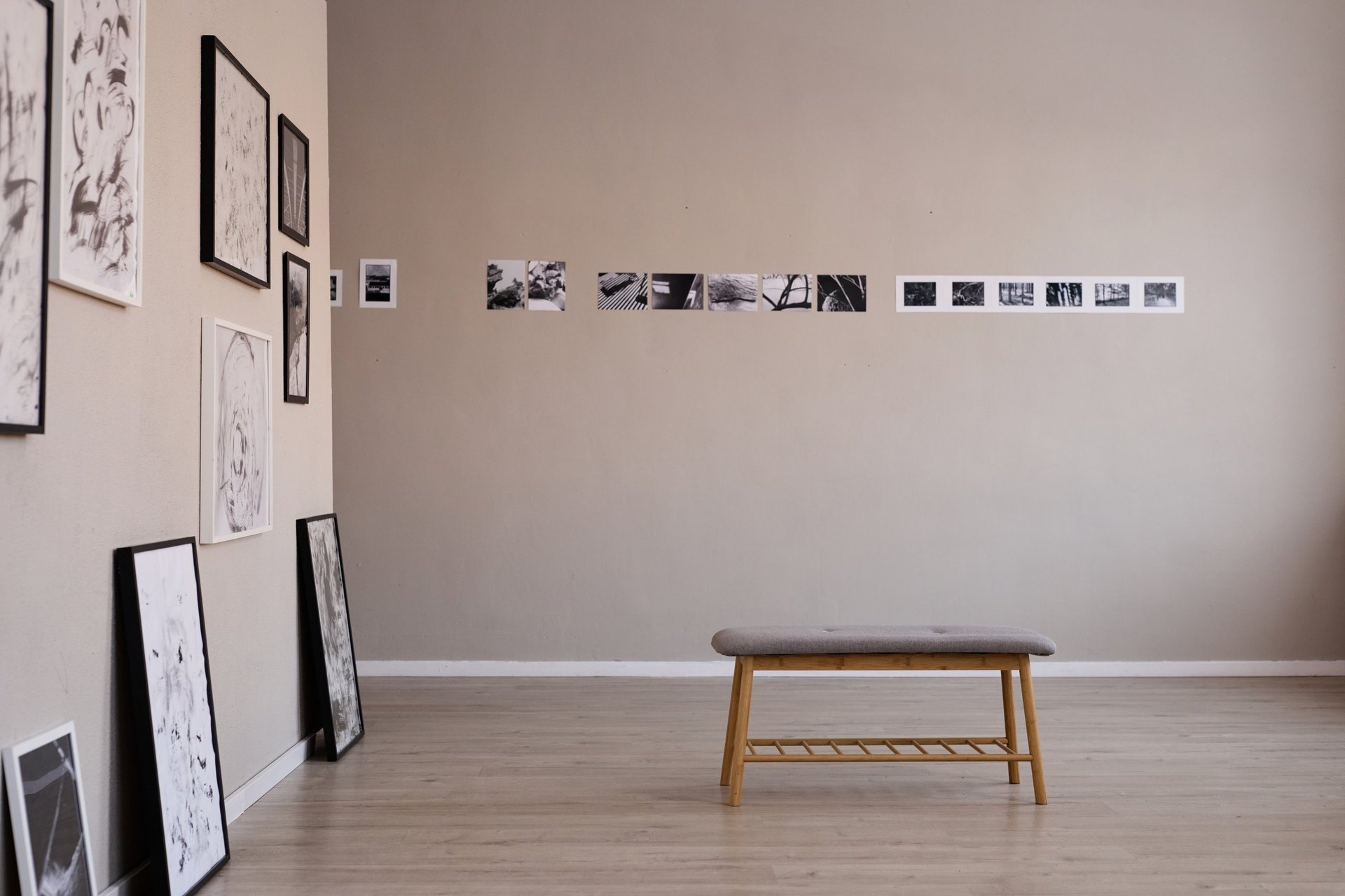 Empty art gallery with framed photographs